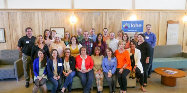 Group of people smiling at Fahe's Mortgage Broker Bootcamp.
