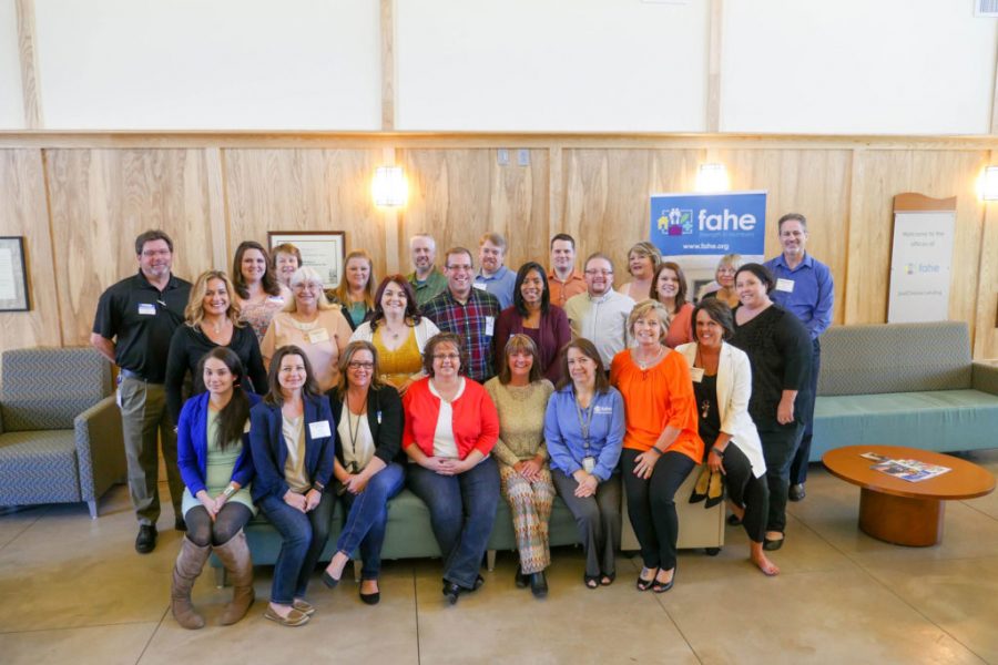Group of people smiling at Fahe's Mortgage Broker Bootcamp.