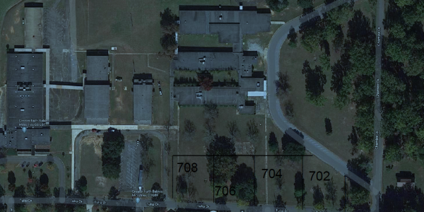 Birdseye view of house plots and land.