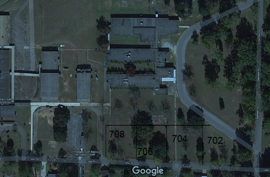 Birdseye view of house plots and land.