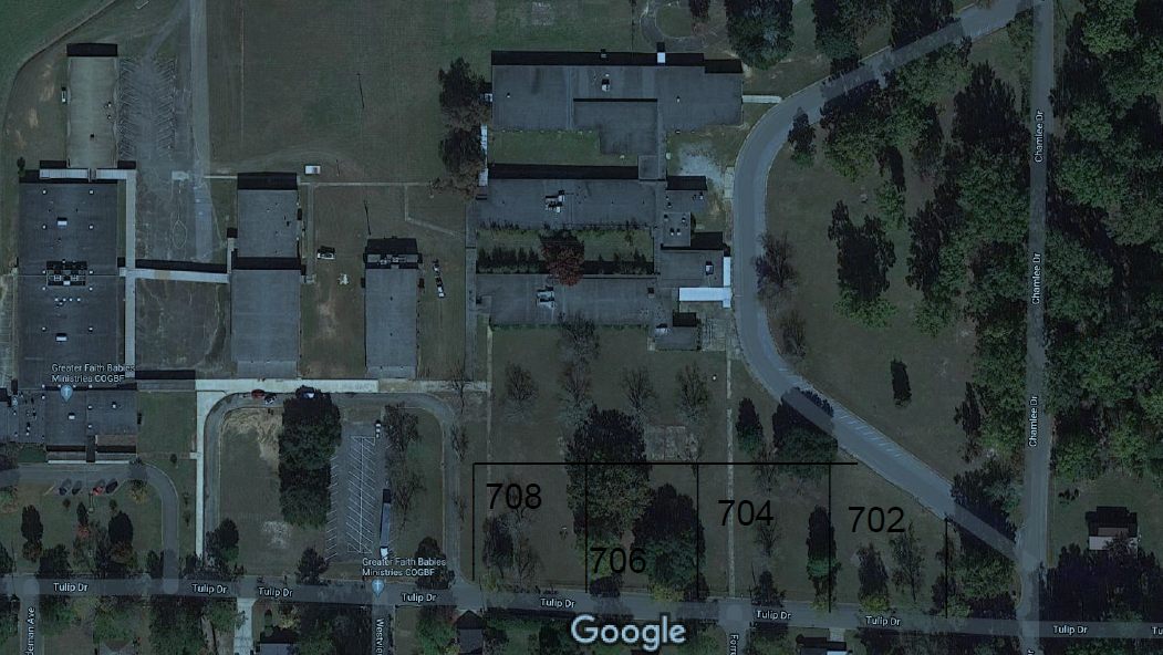 Birdseye view of house plots and land.