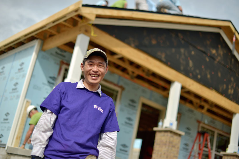 A new homeowner works on his house during a blitz build hosted by Fahe Member Knoxville Habitat for Humanity.